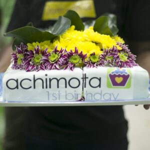Close up of top cake. Fresh chrysanthemum purple and yellow flowers