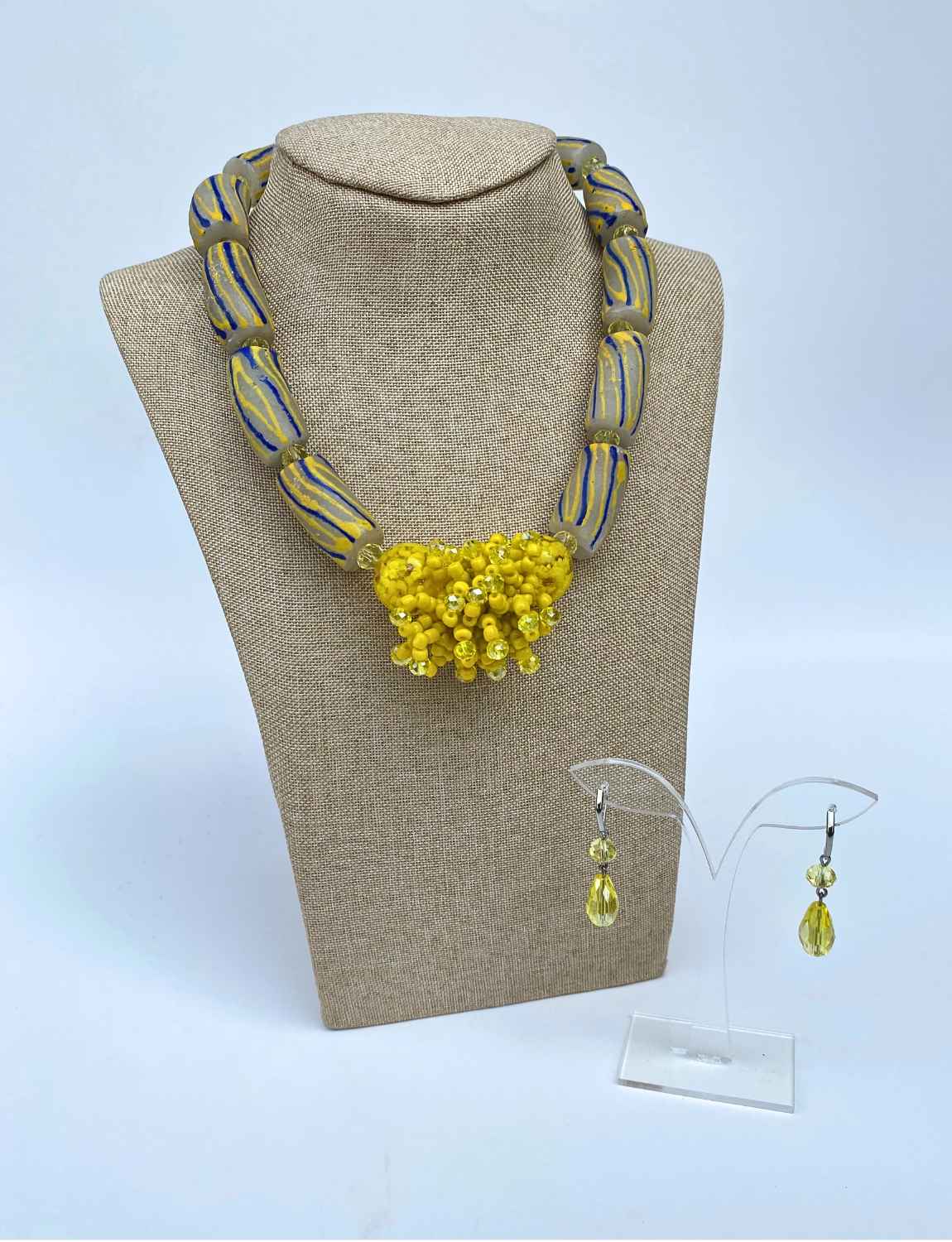 Yellow and blue fur necklace made with glass beads from Ghana