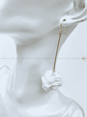 White flowery earrings