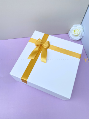 9.5inch square box with gold ribbon