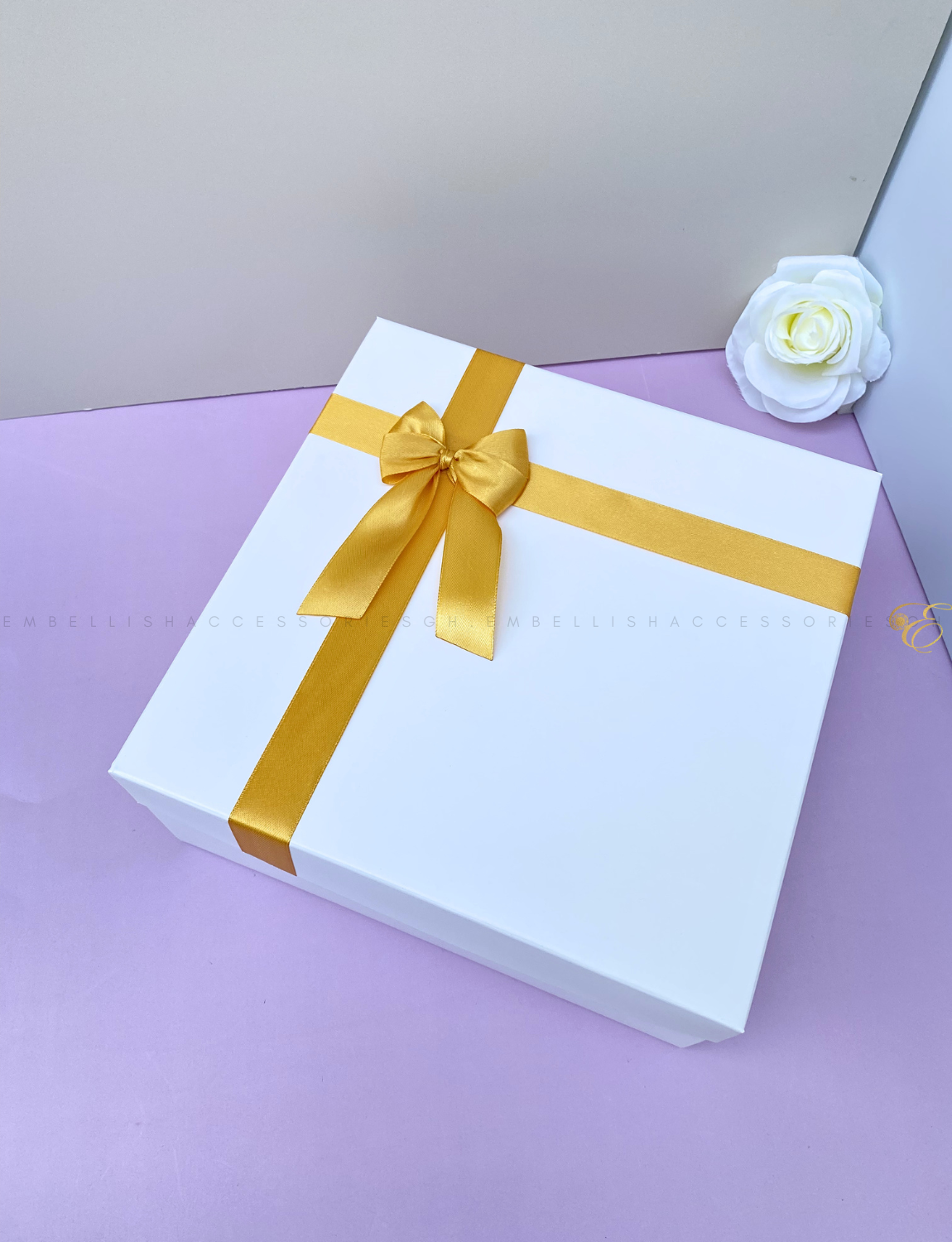 9.5inch square box with gold ribbon
